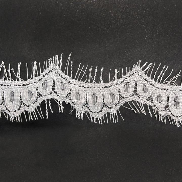 3 Meter White Floral Design Eyelash Lace with Intricate Patterns and Delicate Fringe Details