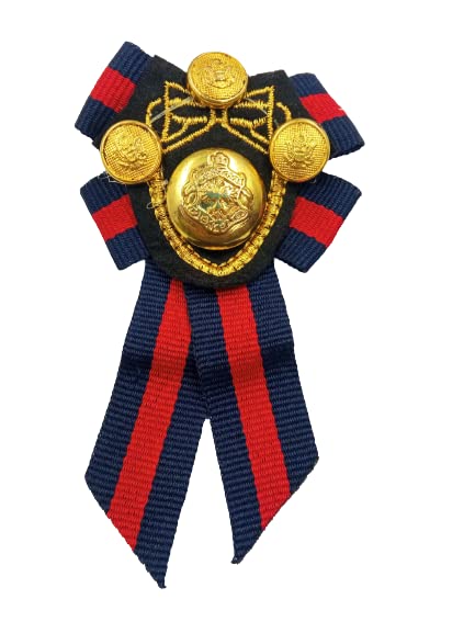 A ribbon brooch with a blue ribbon-like fabric and a gold-colored floral-patterned center, attached to a red and blue ribbon.