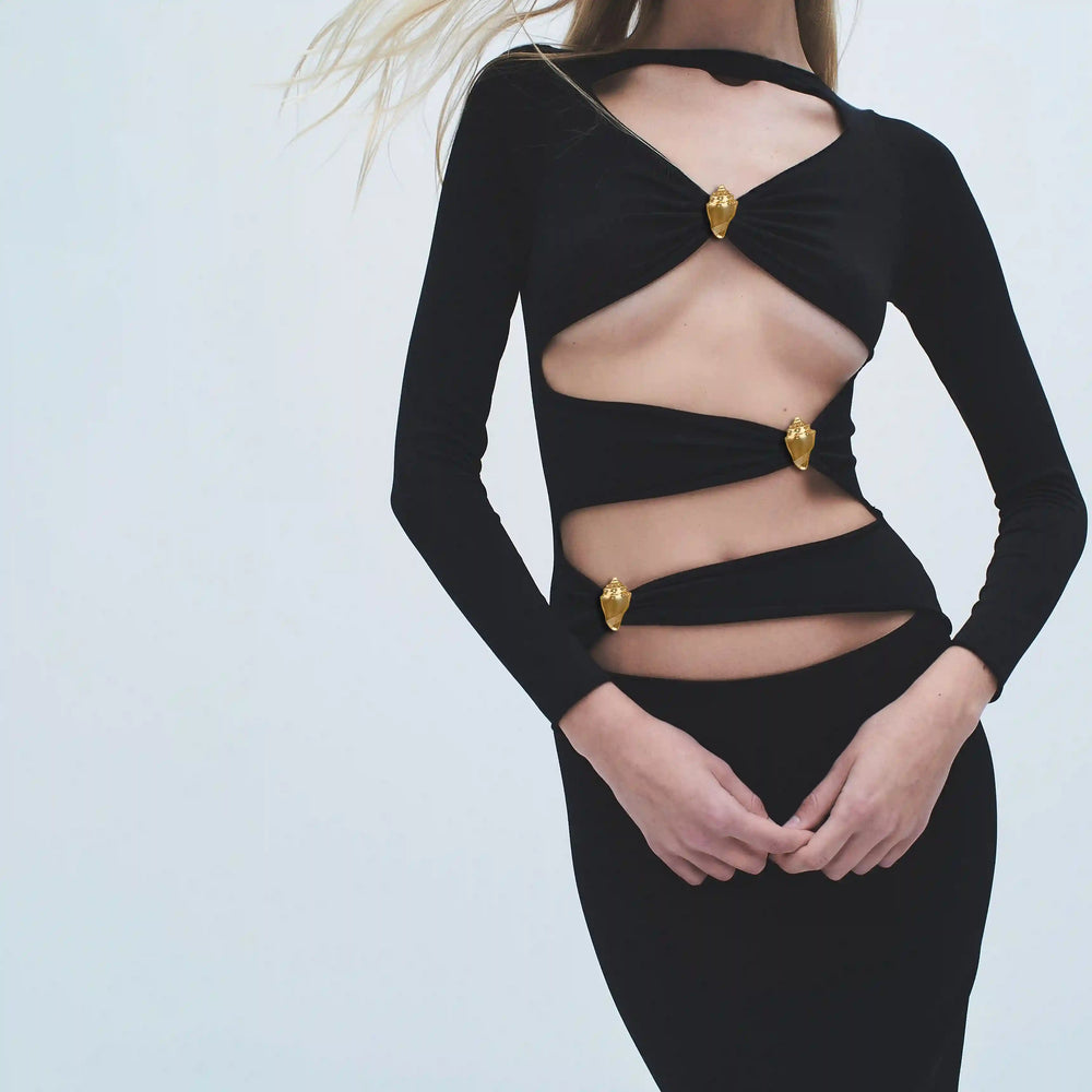 Ani Accessories Gold Conch Shell Metal Buckles on the model strappy black dress in  a white background.