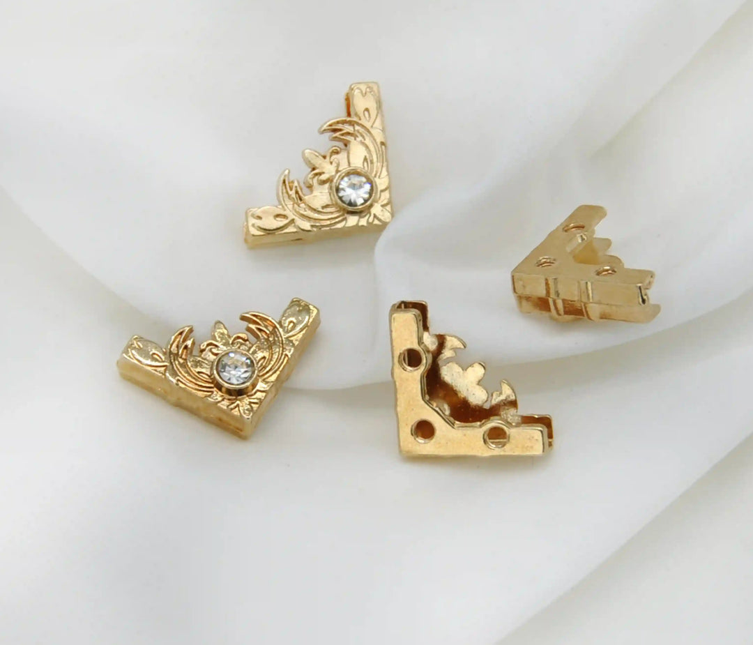 Buy now Ani  Accessories  4 pieces of  mini gold intricate with Rhine stone  on white cloth background with 2 front side image and 2 sided image of collar tips