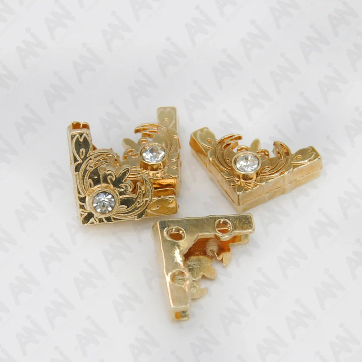 Ani Accessories | 3 gold  intricate with rhinestone front sided and 1 back sided image of collar tip