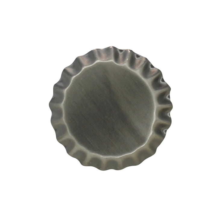 Front side of antique silver button by Ani Accessories.