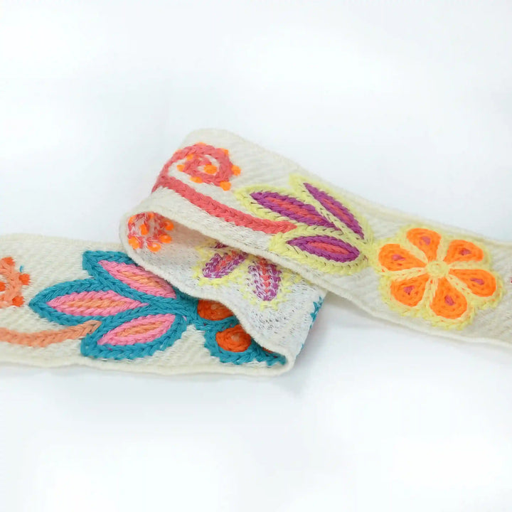 Embroidered  Crochet Lace trim with colorful floral patterns on a white background | Ani Accessories