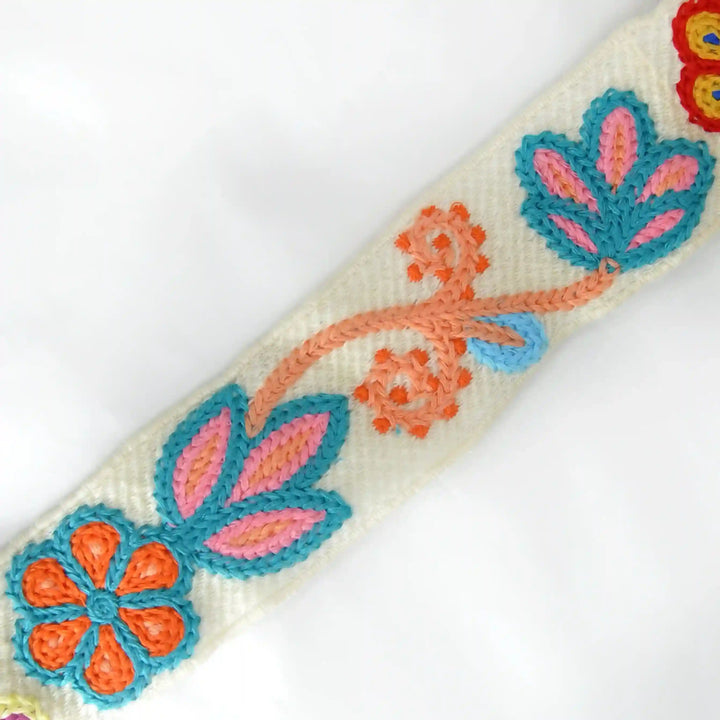 Decorative Crochet lace with floral patterns in orange, pink, and blue on a white background | Ani Accessories