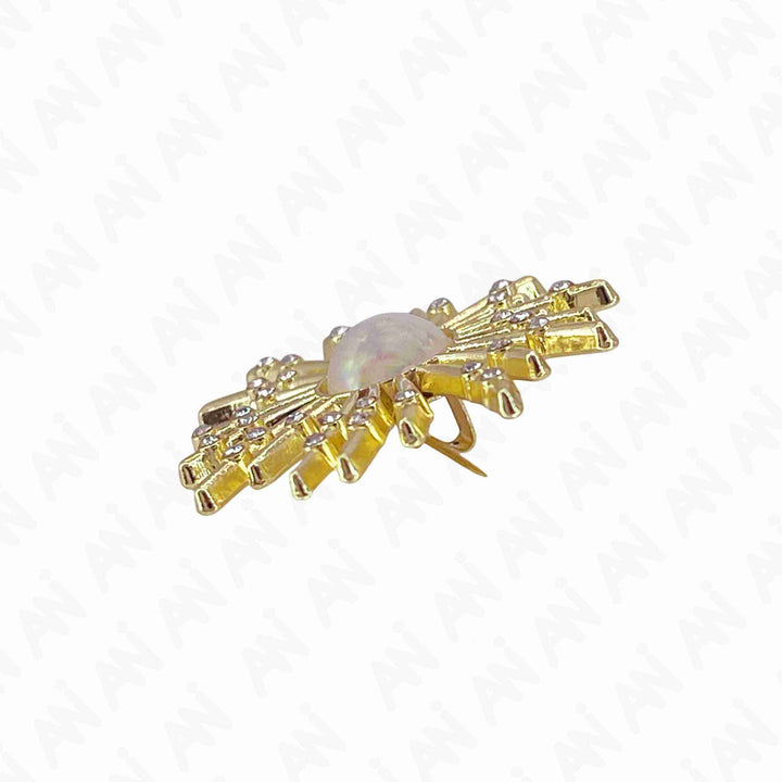Elegant gold floral pearl brooch for sarees & outfits with intricate design and shimmering details