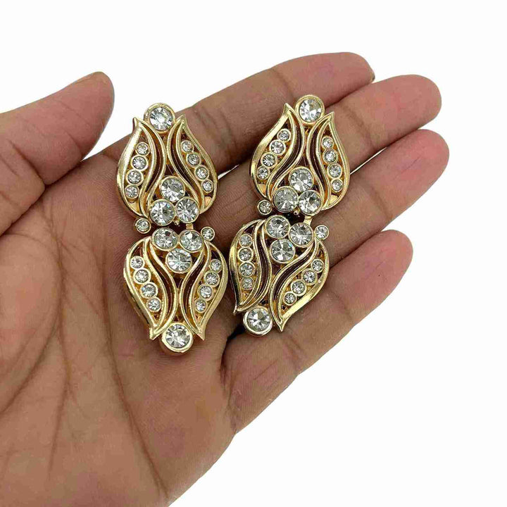 Art Deco-inspired or floral/leaf-shaped Frog Closure Buttons