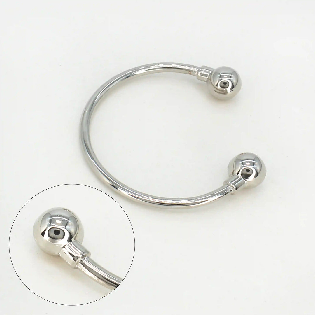 Ani Accessories Curved Circular Elegance Thin silver Metal Buckle with zooming on the tip of the buckle to show the design in a small image in  white background.