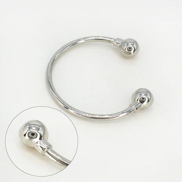 Ani Accessories Curved Circular Elegance Thin silver Metal Buckle with zooming on the tip of the buckle to show the design in a small image in  white background.