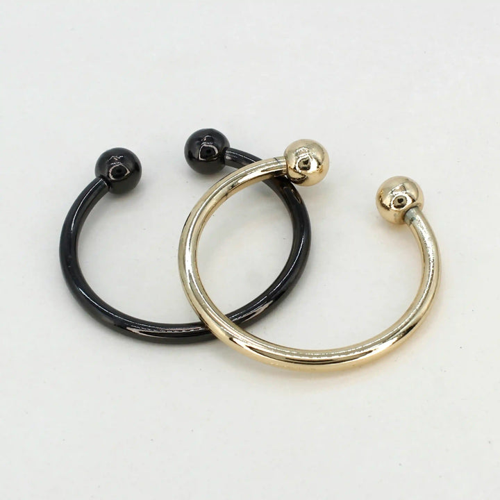 Ani Accessories Curved Circular Elegance Gold &Black Metal Buckle  placing together in the white background.