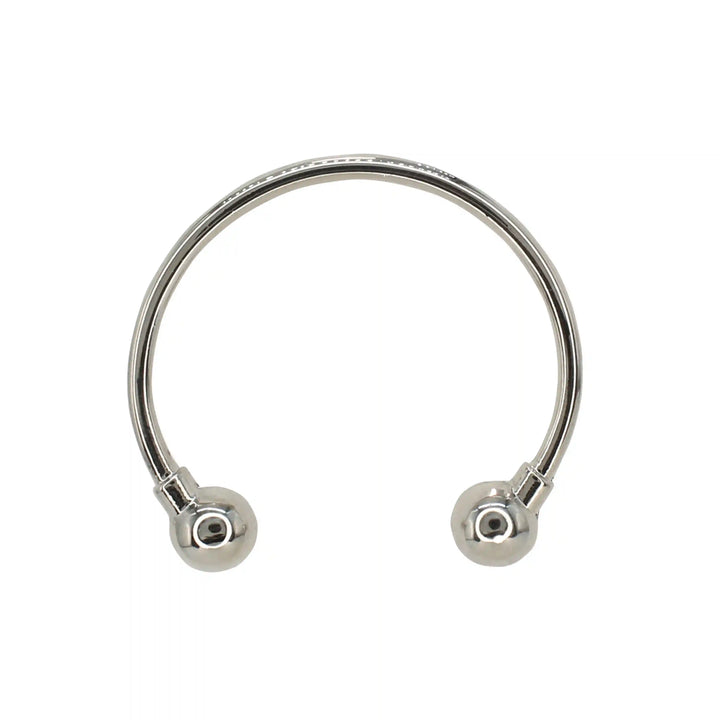 Ani Accessories Curved Circular Elegance Thin Silver Metal Buckle  zooming image in the white background to show the reflection of the buckle.