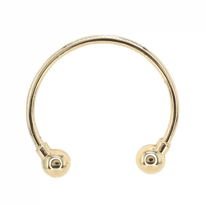 Buy Now Ani Accessories Curved Circular Elegance Thin gold Metal Buckle  in the zooming image in the white background to show the reflection of the buckle.