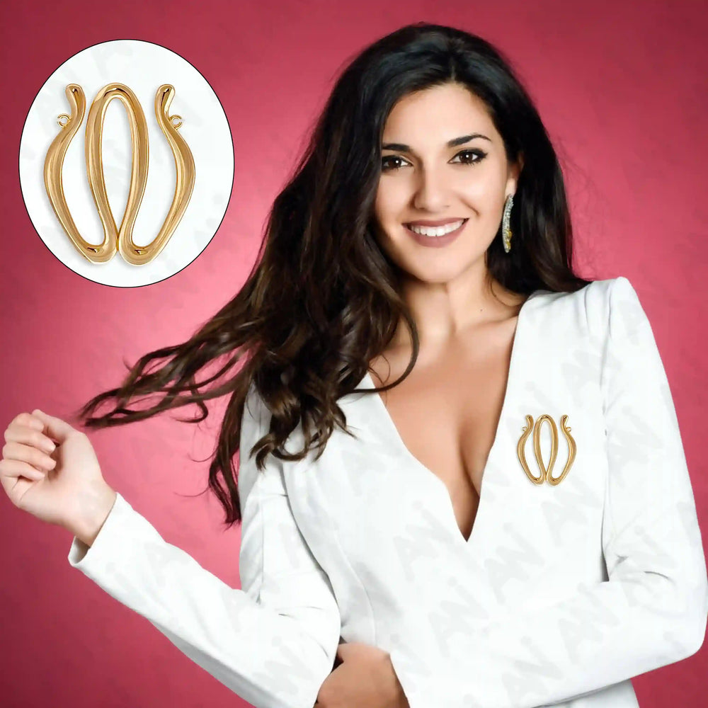 Ani Accessories Double Wave Design Metal Buckle/ Broach on the model white blazer in a pink background.