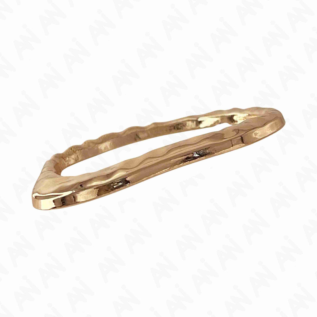 Ani Accessories Flowing Loop Shape Golden Metal Buckle in slant flat angle to  show the thickness of the golden buckle.