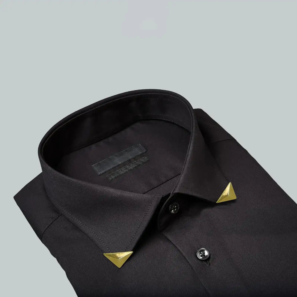 Gold Triangle Pyramid Peak collar tip on folded black shirt 