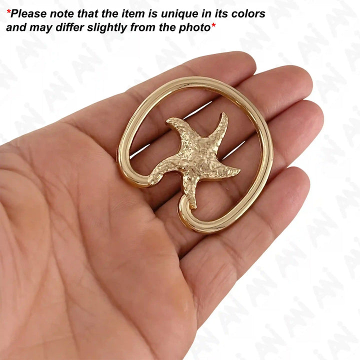 Ani Accessories Metal Starfish Gold Bikini Ring Buckle place on hand with caution on the background of product slightly differ from the image.
