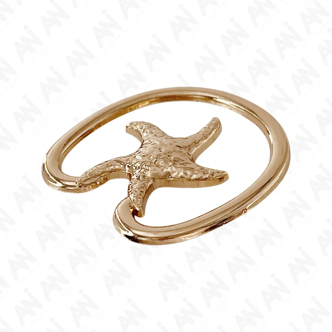 Ani Accessories Metal Starfish Gold Bikini Ring Buckle in a flat angle on a white background to show the thickness of the buckle.
