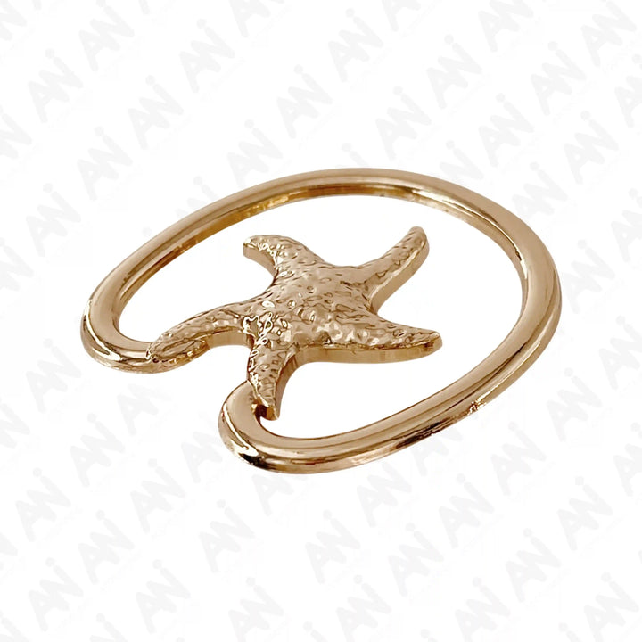 Ani Accessories Metal Starfish Gold Bikini Ring Buckle in a flat angle on a white background to show the thickness of the buckle.