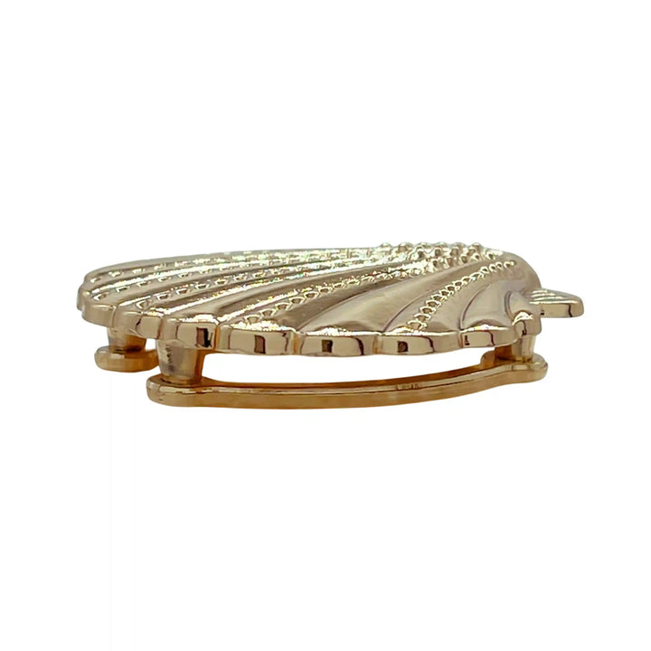 Ani Accessories Scallop Shell Metal Buckle Zooming image of  the golden buckle from the side view of the buckle in the white background.