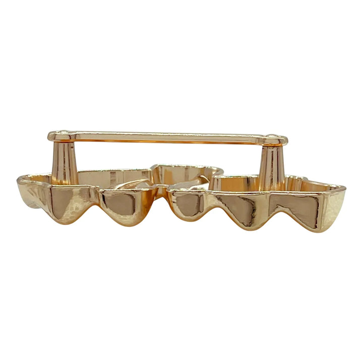 Ani Accessories Sculpted Gold Abstract Buckle  zooming in the white background.