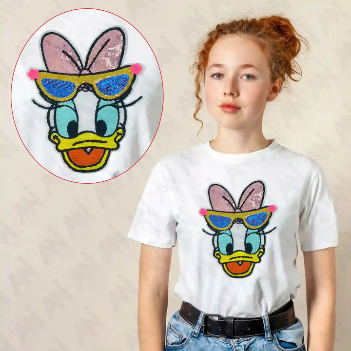 Ani Accessories Sequins Daisy Duck patch shown on model for women jackets shirts denim jeans bags and DIY clothing projects