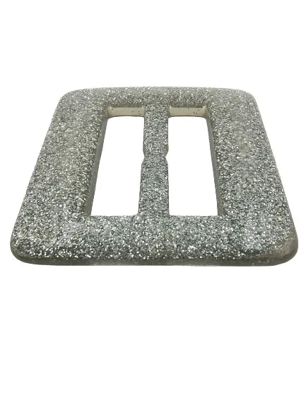 Buy now Ani Accessories resin buckle designed with dazzling silver sparkle, placed in a flat angle on a white background.