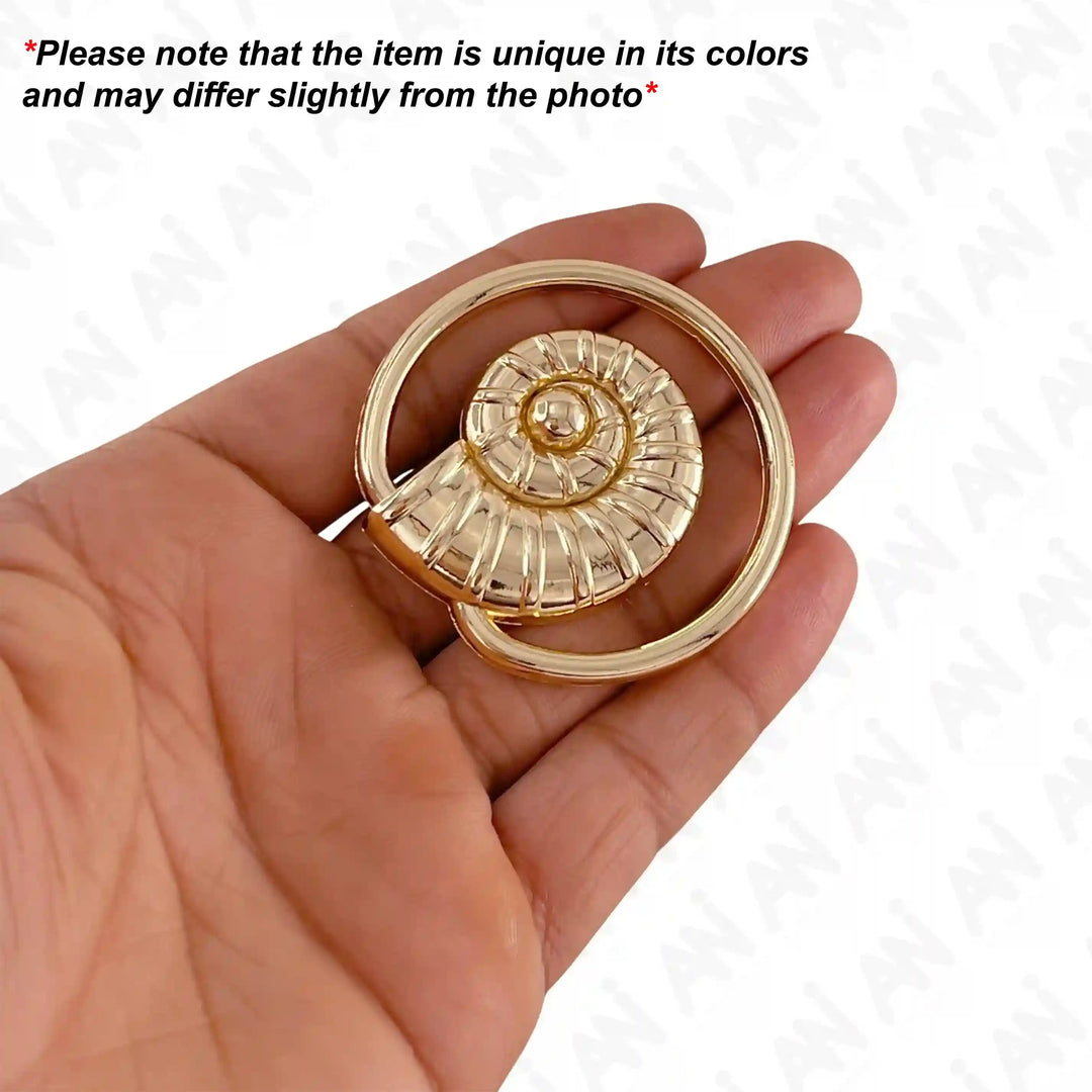 Ani Accessories Spiral Shell Gold Shiny Buckle hold on the hand to show the buckle with caution  text of product may differ from the image.