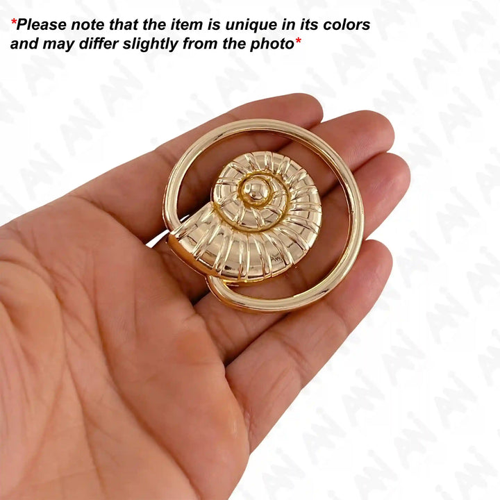 Ani Accessories Spiral Shell Gold Shiny Buckle hold on the hand to show the buckle with caution  text of product may differ from the image.