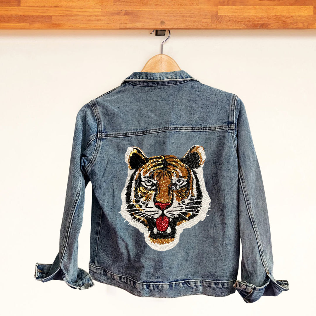 Ani Accessories Tiger’s Roar beaded sew patch on denim highlighting size and sequin detailing