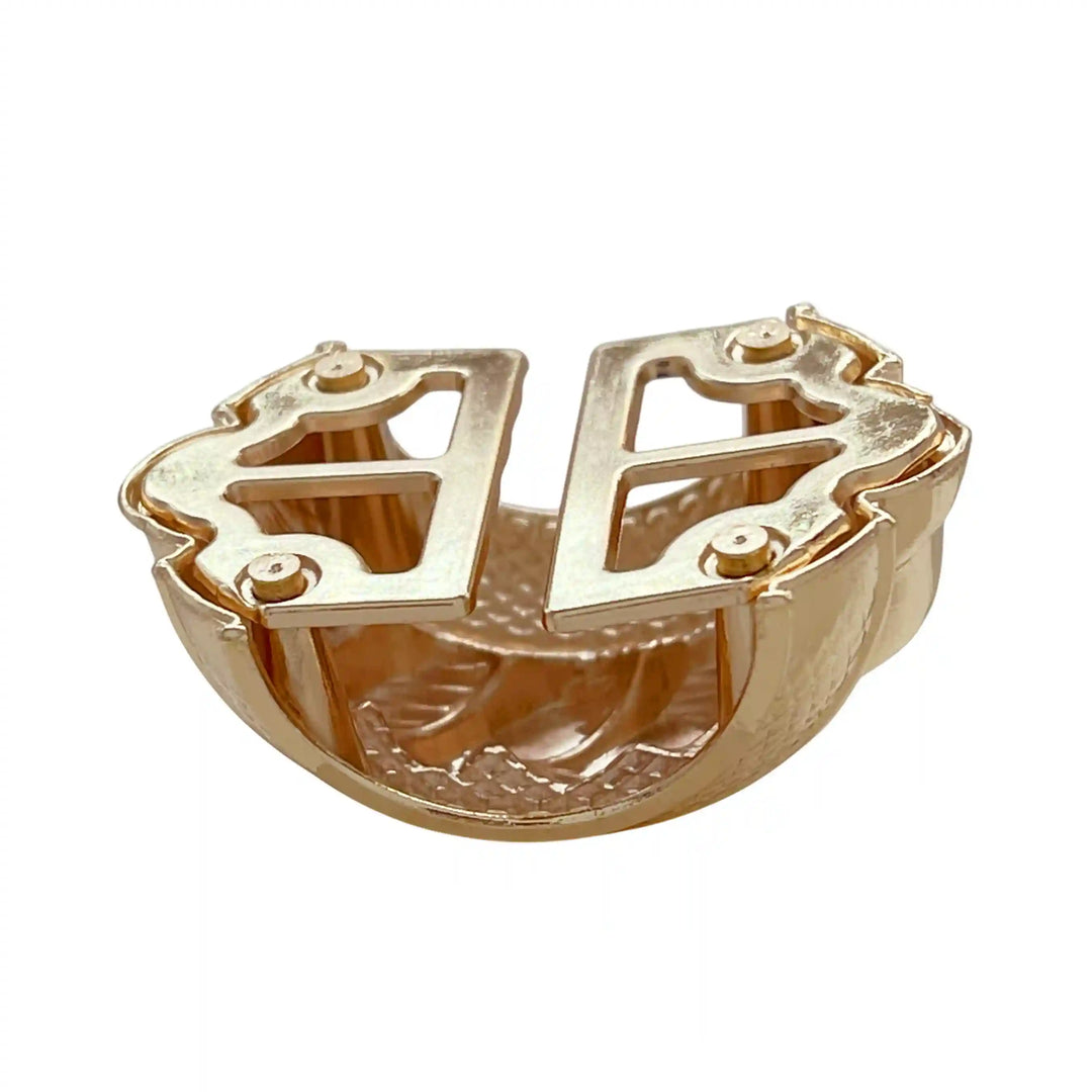 Ani Accessories Vintage Gold Rope Barrel Buckle backside top view to show the hollowness of the buckle in the white background.