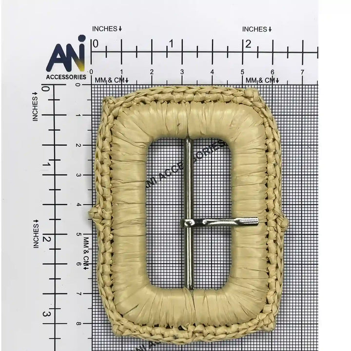 Ani Accessories double layer braided rectangle buckle with prong placed on a size chart bar graph to show exact size of buckle