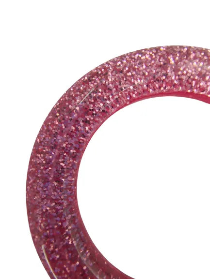 Ani Accessories pink sparkling resin ring buckle  Zooming in the corner image  of the buckle.