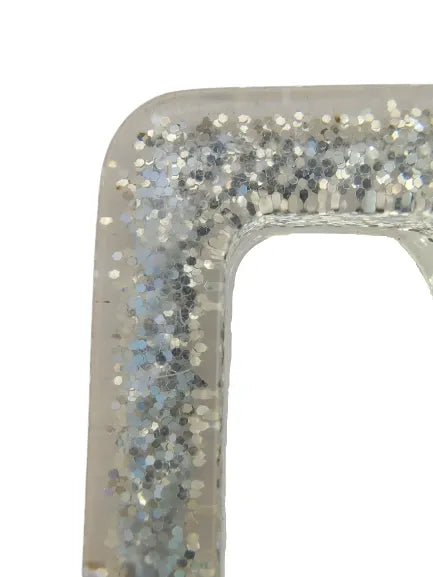 Ani Accessories rectangle sparkling resin buckle with silver shine, Corner zooming image in white background.