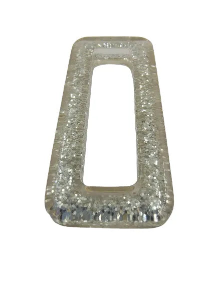 Ani Accessories rectangle sparkling resin buckle with silver shine in a flat angle in a white background.