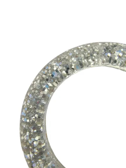 Ani Accessories shiny silver resin ring buckle with smooth glossy finish Zooming image in Corner of the buckle.