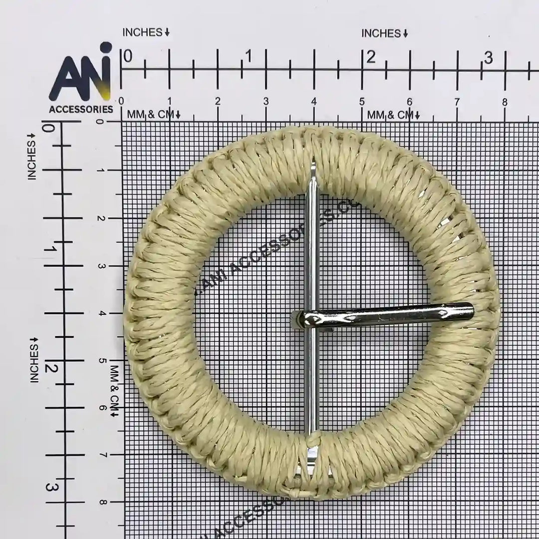 Ani Accessories DIY Circle woven cream  Raffia  buckle size with prong  placed on a size chart graph 