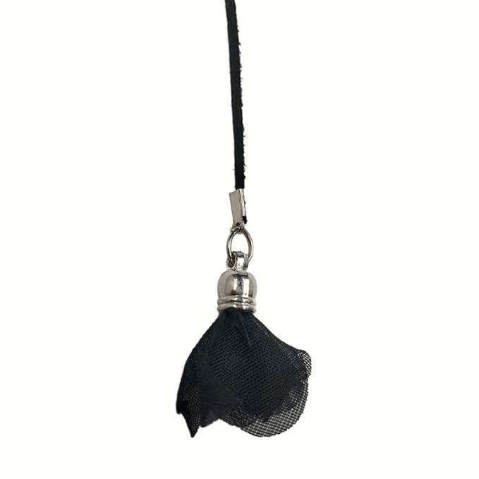 Ani Accessories black suede belt with a zoomed-in tassel detail shown on a white background. This women’s tassel belt features a metal stopper.