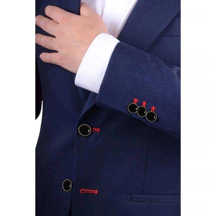 ANI Accessories black gold rim metal blazer buttons on a navy suit jacket front and sleeve cuff, with red contrast buttonholes.