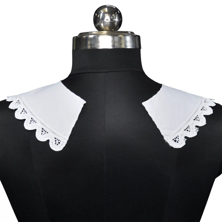 Chic Cutwork Embroidery Peter Pan collar designed with airy embroidery and refined curved hem