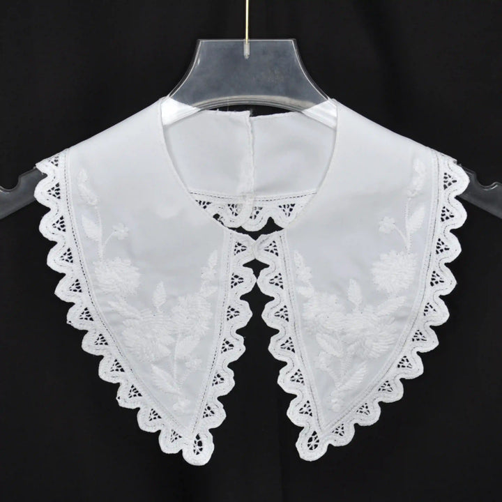 Classic Cutwork Embroidery Peter Pan collar showcasing delicate perforated design and curved border