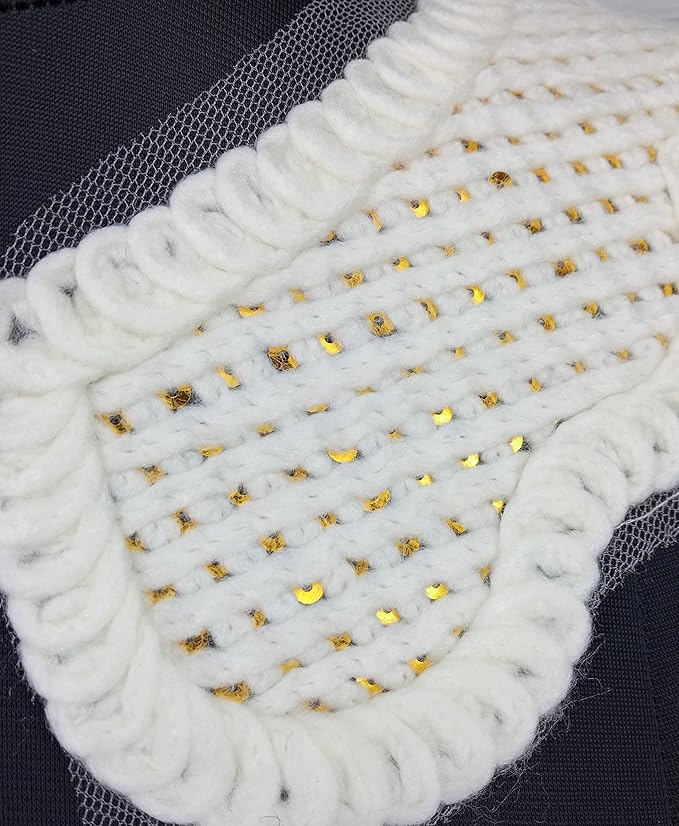 Close-up of golden sequins cross shoulder neckline emphasizing intricate sequin pattern and fine embroidery