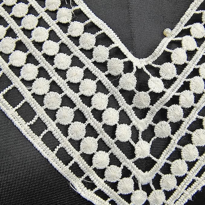 Close-up view of deep V neckline by Ani Accessories showing precise stitching and elegant craftsmanship