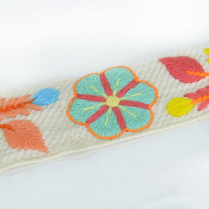 Zooming white Embroidered floral design Crochet lace on a white background | Ani Accessories
