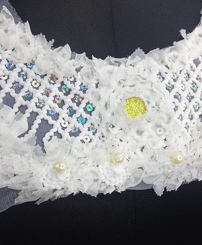 Cross motif neckline featuring multicolor sequins, pearls and yellow stone center