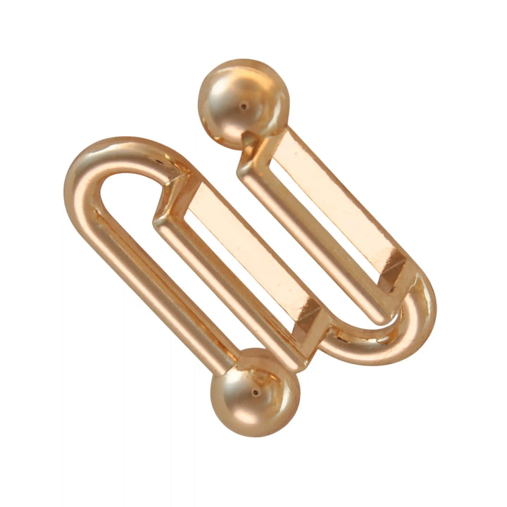 Golden S-shaped handle with balls