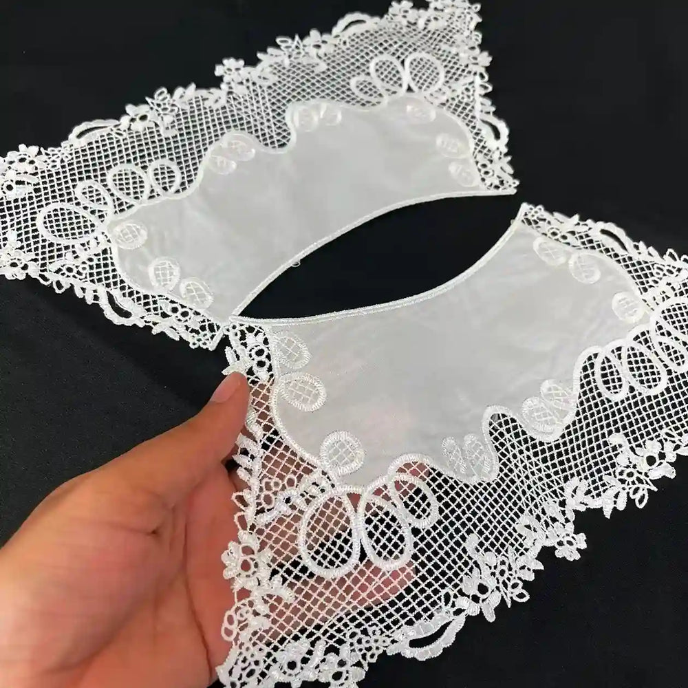 Elegant Pilgrim Flower Peter Pan collar crafted with detailed blossom motifs and smooth curved border