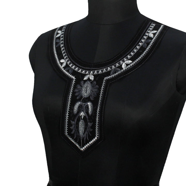 Black velvet with silver embroidery neckline