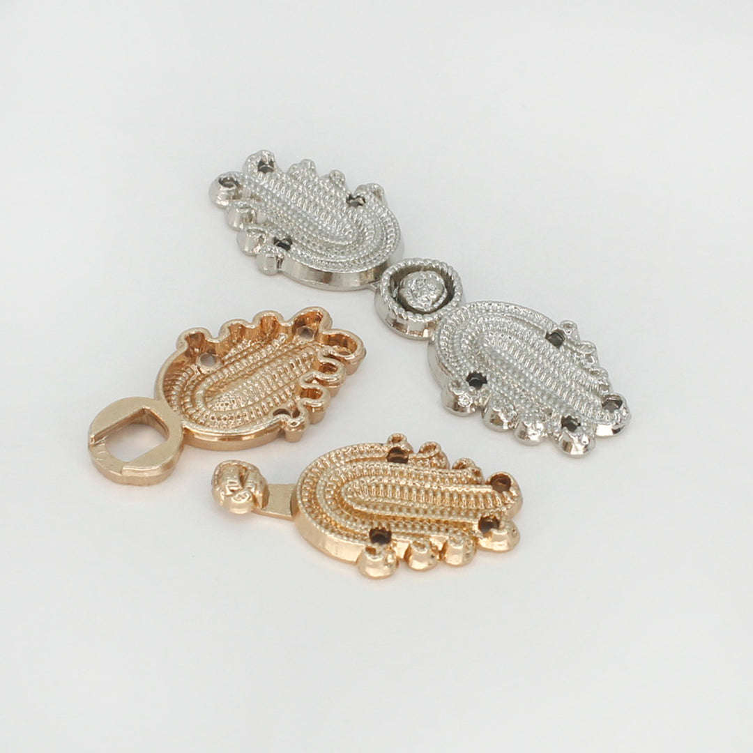 Filigree double-S Frog closure metal button