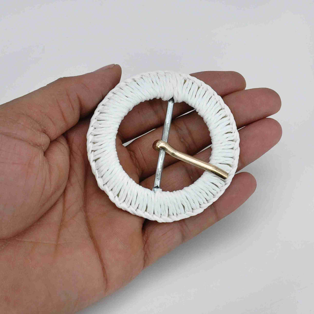 Natural handmade boho raffia prong buckle woven belt buckle accessory for bags dresses garments and DIY craft use.