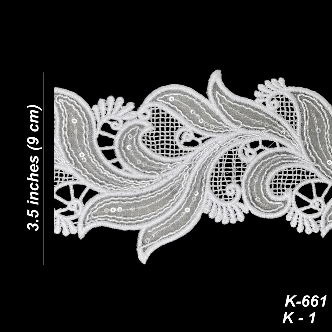 White floral lace trim with mesh and embroidered details, shown on a black background with a vertical measurement marker indicating 3.5 inches (9 cm) and text reading K-661 K-1.