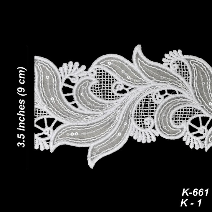 White floral lace trim with mesh and embroidered details, shown on a black background with a vertical measurement marker indicating 3.5 inches (9 cm) and text reading K-661 K-1.